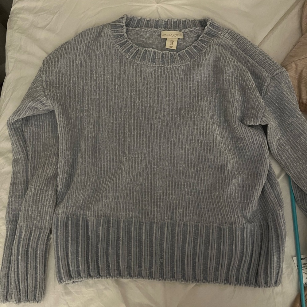 Baby blue sweater.
